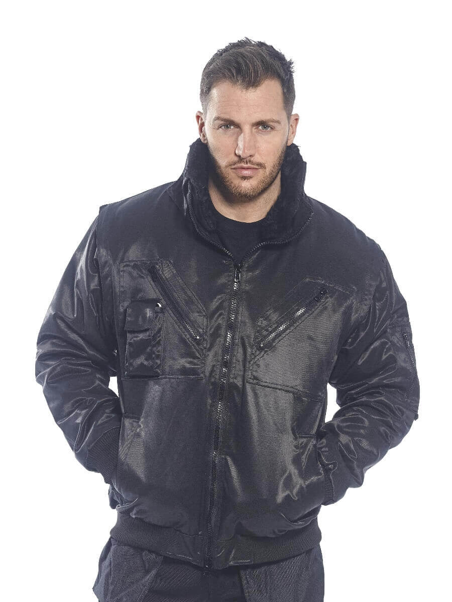 Schwarze Jacke mit Fellkragen und Reißverschluss, Brusttaschen mit Ziernähten