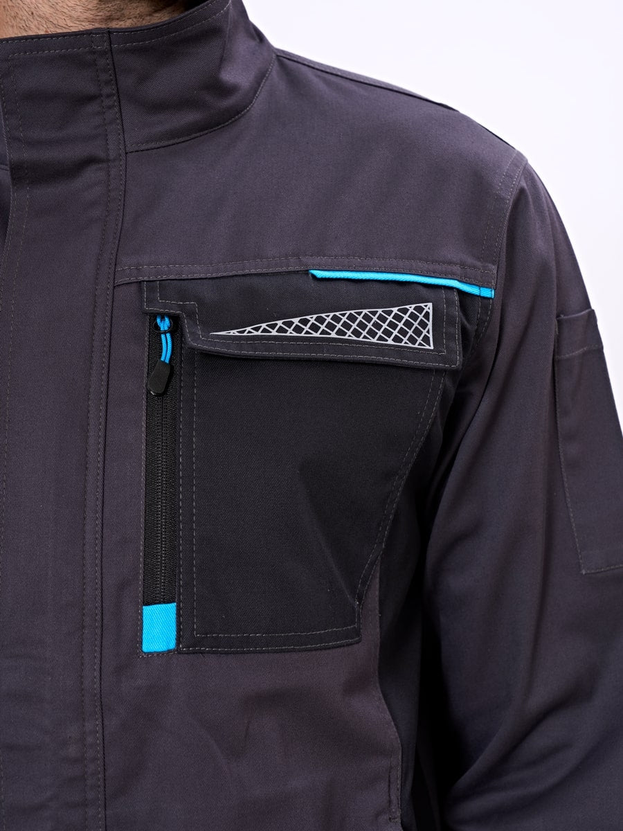 Bundjacke dunkelgrau: Brusttasche mit Zipper, Mesh-Einsatz und blauen Besätzen